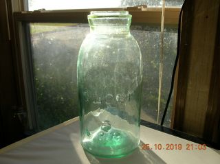 1/2 Gal.  Lt.  Green Globe Vintage Fruit Jar