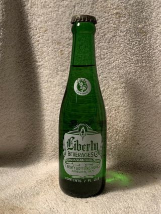 Full 7oz Liberty Beverages Ginger Ale Acl Green Soda Bottle Auburn,  N.  Y.