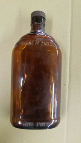 Vintage One Pint Amber Brown Whiskey Bottle With Words Imprinted In Glass Empty