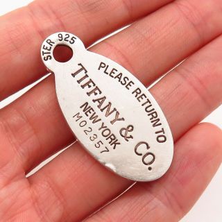 Tiffany & Co.  925 Sterling Silver " Please Return To Tiffany " Oval Tag Pendant