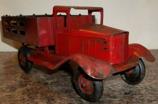 VINTAGE TIN TRUCK 9 1/2 inches long 3 1/2 in high - girard tires 3