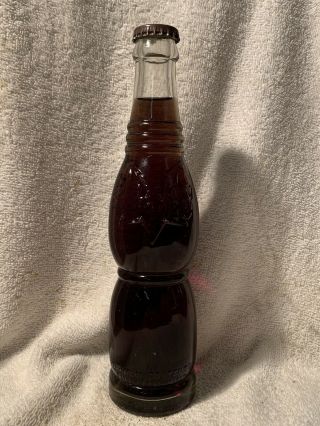 Full 8oz Nu - Icy Grape Soda Embossed Soda Bottle