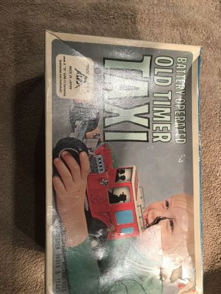 Old Timer Taxi Battery Operated In The Box.  Japan Tin Toy Car