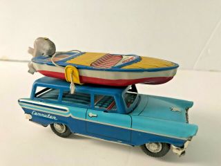 Japan Tin Toy Friction Sedan Car With Boat On Roof