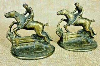 Vintage Plated Iron Equestrian Jockey Whipper In Horses Jumping Fence Bookends