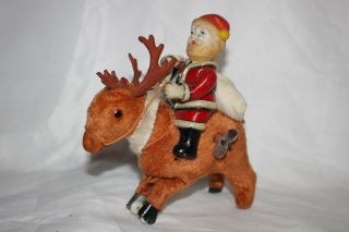 Vtg Japan Tin Litho Wind Up Toy Santa Riding A Reindeer Celluloid Head Nr