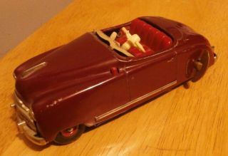 Vintg.  Burgundy Schuco 4012 Wind Up Toy Car - Music And Movement - With Key
