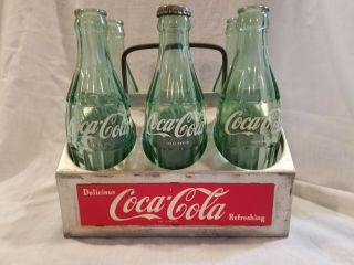 Vintage Coca Cola aluminum metal,  6 pack bottle holder,  with 6 empty Coke bottles 3