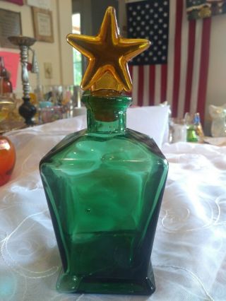 Vintage Green Glass Bottle With Orange Star Stopper