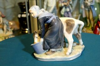 Collectible Old Royal Copenhagen Porcelain Figurine,  Girl With Calf / Cow,  779.