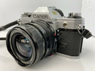 Canon AE - 1 Program 35mm SLR film vintage Camera with Sigma 28mm f/2.  8 Lens 2