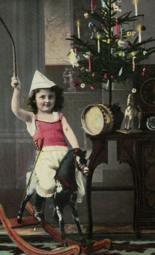 Md1173 Victorian Boy On Rocking Horse Near The Decorated Xmas Tree
