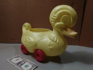 Vintage Yellow Blow Mold Plastic Duck On Wheels
