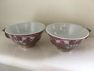 Two Chinese Tea Bowls With White Metal Mounts