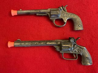 2 Vintage Cast Iron Eagle Toy Cap Guns - 1895 Stevens & 1935 Hubley