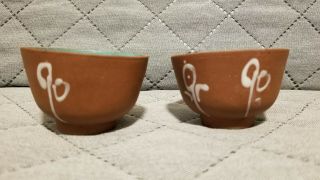 Two Chinese Yixing Zisha Clay Tea Cups With White Glaze Characters