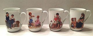 Norman Rockwell Cups Set Of 4.  Gold Trimmed.  1982