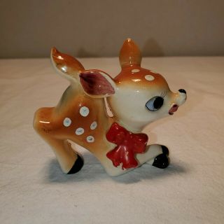 Vintage Ceramic Baby Deer Fawn Bambi Figurine Leaning On Crossed Legs Tounge Out