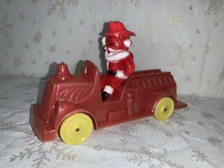 Vintage Santa On Fire Truck Hard Plastic Christmas Rosbro Yellow Wheels Rare