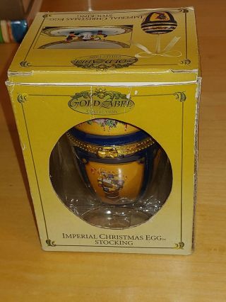 Imperial Christmas Musical Egg Deck The Halls Ornament Revolving Ice Skaters