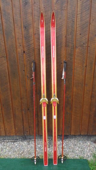 Vintage Wooden 75 " Skis Has Red Finish And Has Bamboo Ski Poles