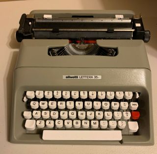 Vintage Olivetti Lettera 35i Portable Typewriter In Gray.
