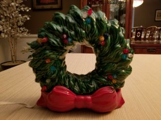 Ceramic 8 1/2 " Tall Green Christmas Wreath With Lighted Red Bow Base