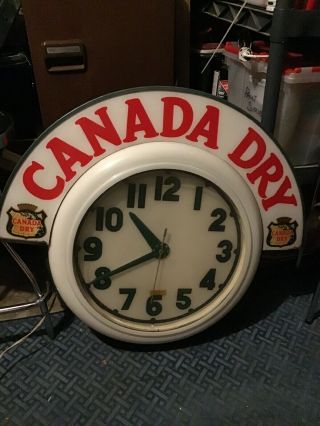 Vintage Electric Neon Clock Company Cleveland Ohio.  Canada Dry Advertisement