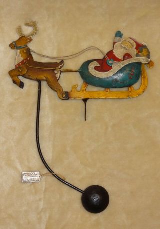 Iron Pendulum Rocker Santa,  Sleigh & Reindeer,  Tag Marked “am.  2002,  Ss 4797”