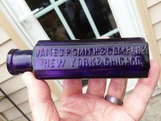 Deep Purple James P.  Smith & Company York & Chi Medicine Bottle Looker