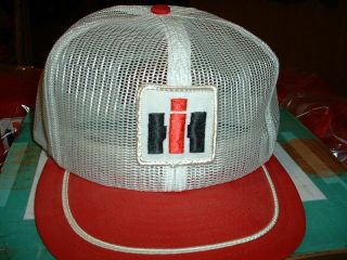 A Vintage Louisville Summer Mesh International Harvester Snap Back Hat With Red