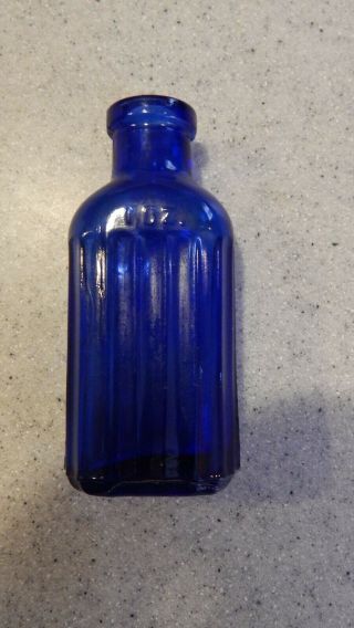 Blue Poison Bottle One Ounce Size 3.  5 Inches Tall