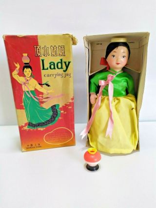 Rare Red China Battery Operated Tin Toy - Lady Carrying Jug Me - 401 1970s