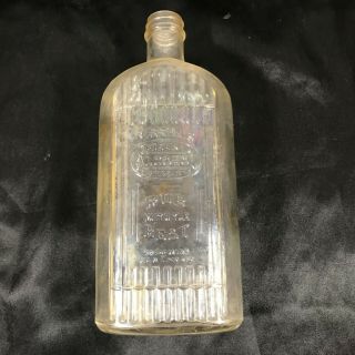 Vintage Embossed Glass Medicine Bottle Merrell 