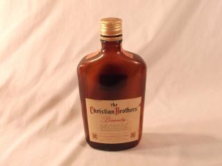 Vintage Advertising The Christian Brothers Brandy Bottle Embossed Amber One Pint