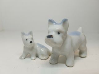 2 Vintage Blue And White Porcelain Dog Puppy Lg And Sm Figurines Marked As Japan