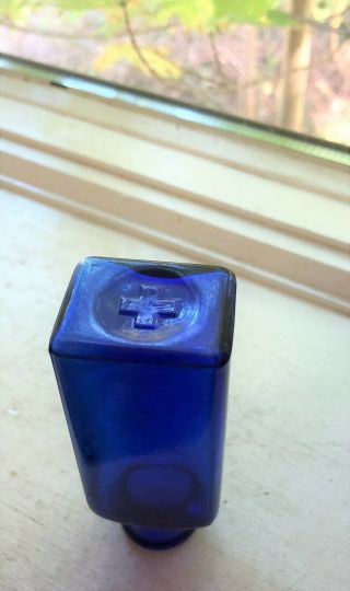 Cobalt Blue Blown Medicine With The American Red Cross Symbol On Base.