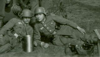German 150mm Artillery and crew,  shell casings,  equipment.  WW2 Photo 2