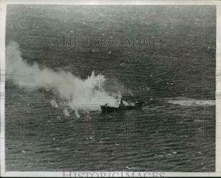 1944 Press Photo A Japanese Cargo Ship,  Strafed,  Bombed And Sunk At Eniwetok