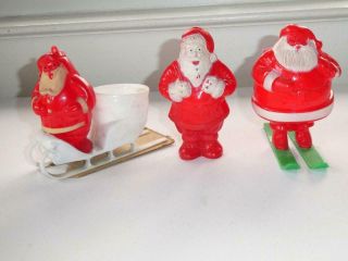 3 Vintage Hard Plastic Santa Claus Candy Containers On Ski 