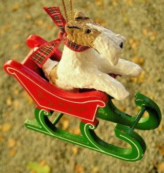 Wire Fox Terrier In A Sled Christmas Ornament