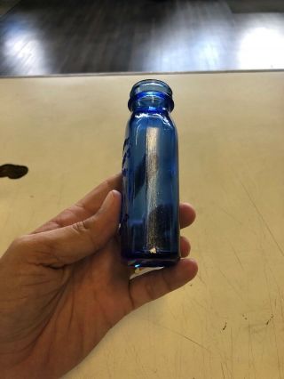 Vintage Advertising Phillips Milk Of Magnesia Embossed Blue Glass Bottle 3