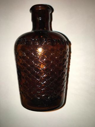 Ca.  1900 Poison 4” Reddish Amber Kj - 12 Crosshatched Ntbt Jug