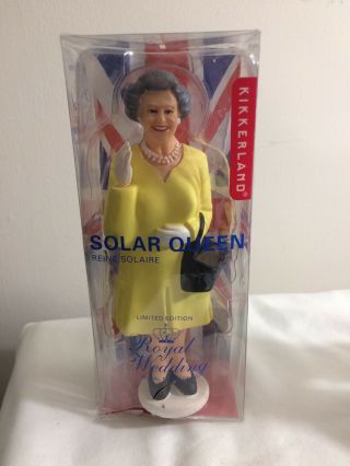 Kikkerland Solar Queen Elizabeth Waving Figurine,  Yellow Dress Royal Wedding