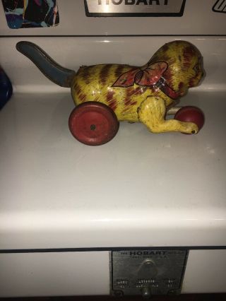 Vintage Marx Tin Wind Up Cat On Wheels With Ball.  Wind Up Tail