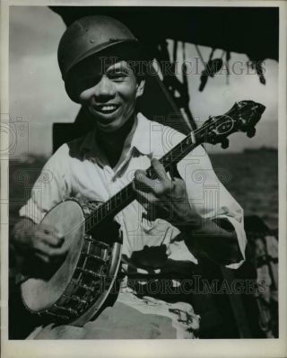 1944 Press Photo A Filipino Strums His Banjo Aboard A U.  S.  Coast Guard Transport