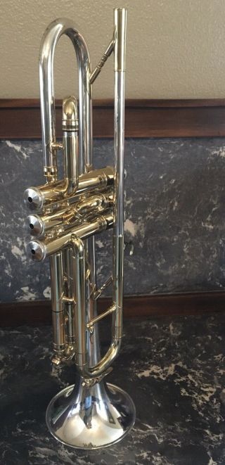 Vintage King H.  N.  White 20 Symphony Silversonic Trumpet Player 2