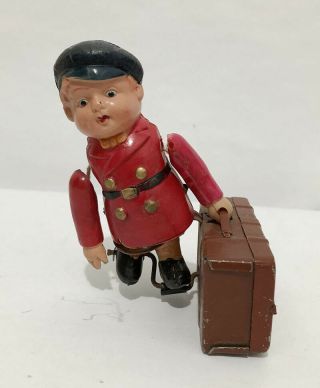 1940 ' s OCCUPIED JAPAN CELLULOID WIND - UP TIN TOY LUGGAGE BOY CARRIER (OSH8 3