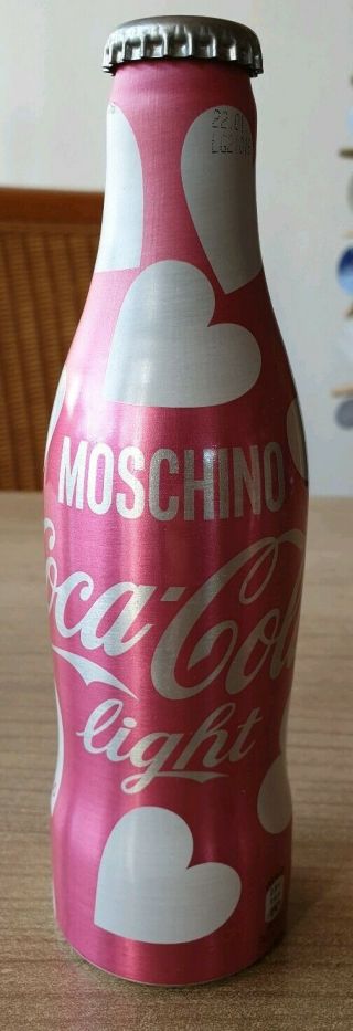 Coca Cola Alu Bottle From Switzerland.  Full Bottle.  Moschino Designer
