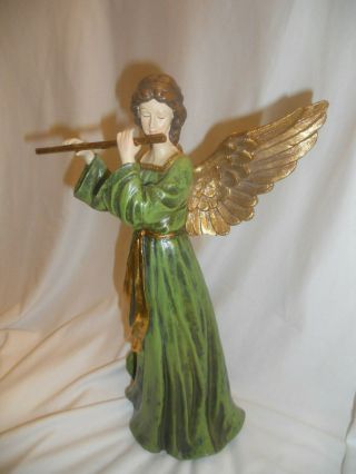 Christmas Angel Green and gold Angel playing the flute 14 1/4 